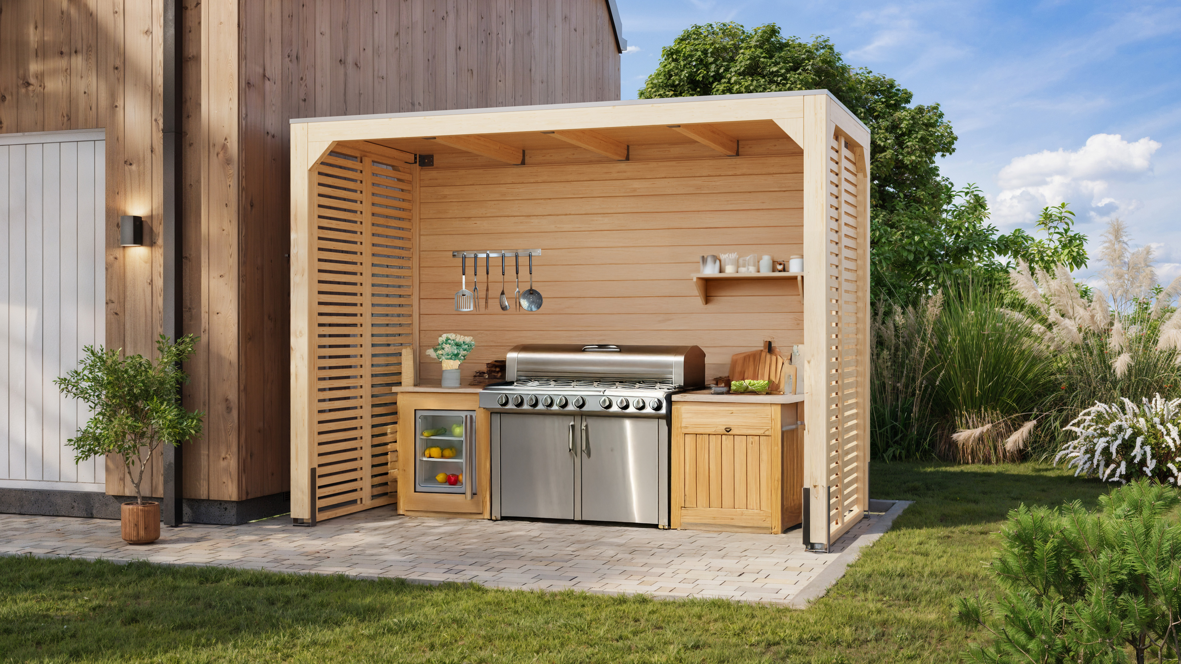 Karibu Grillpavillon mit integrierter Outdoorküche im Garten aufgebaut