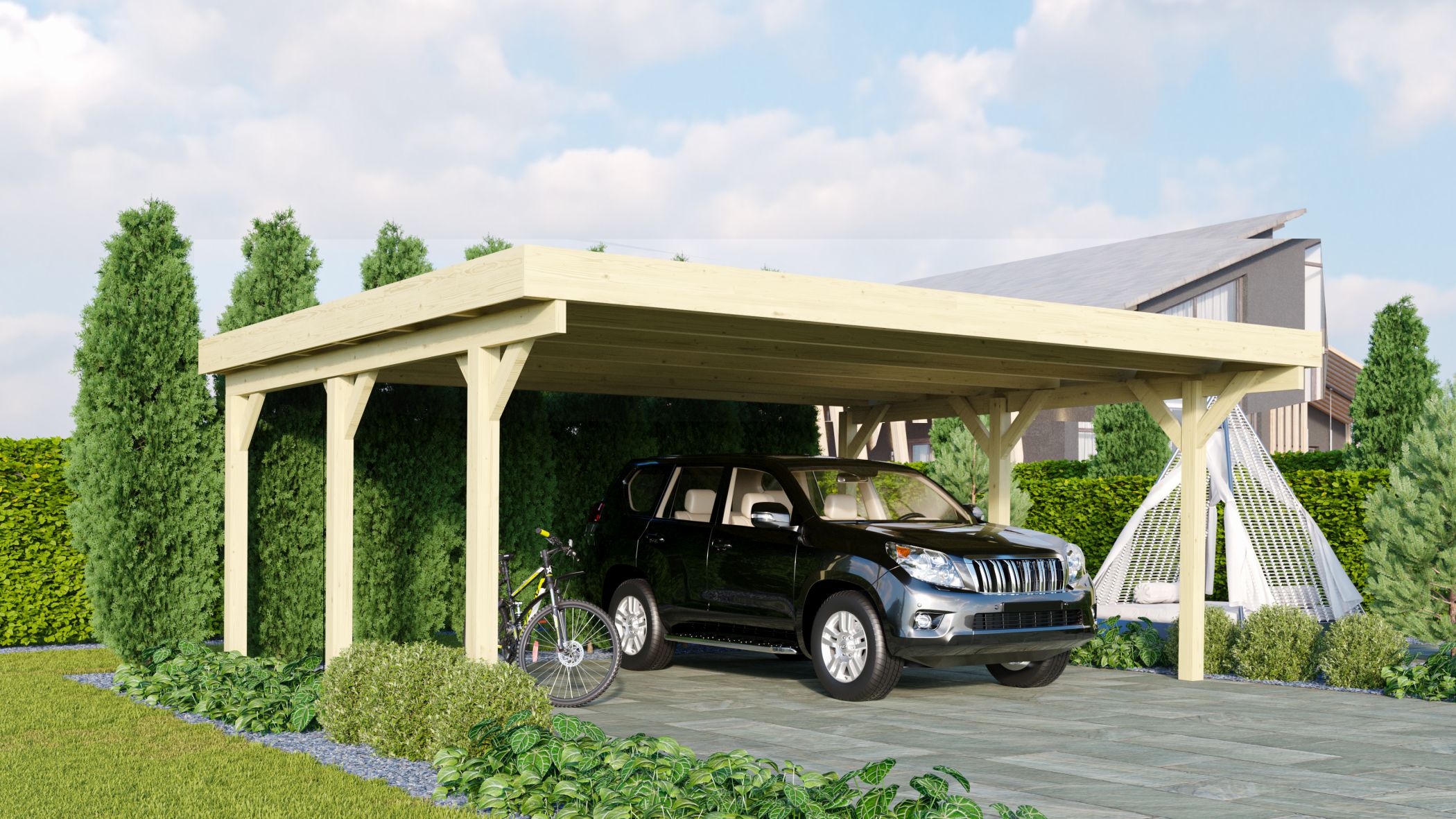 Karibu Doppelcarport Classic 1 aus KDI-Massivholz mit Flachdach im Garten aufgebaut