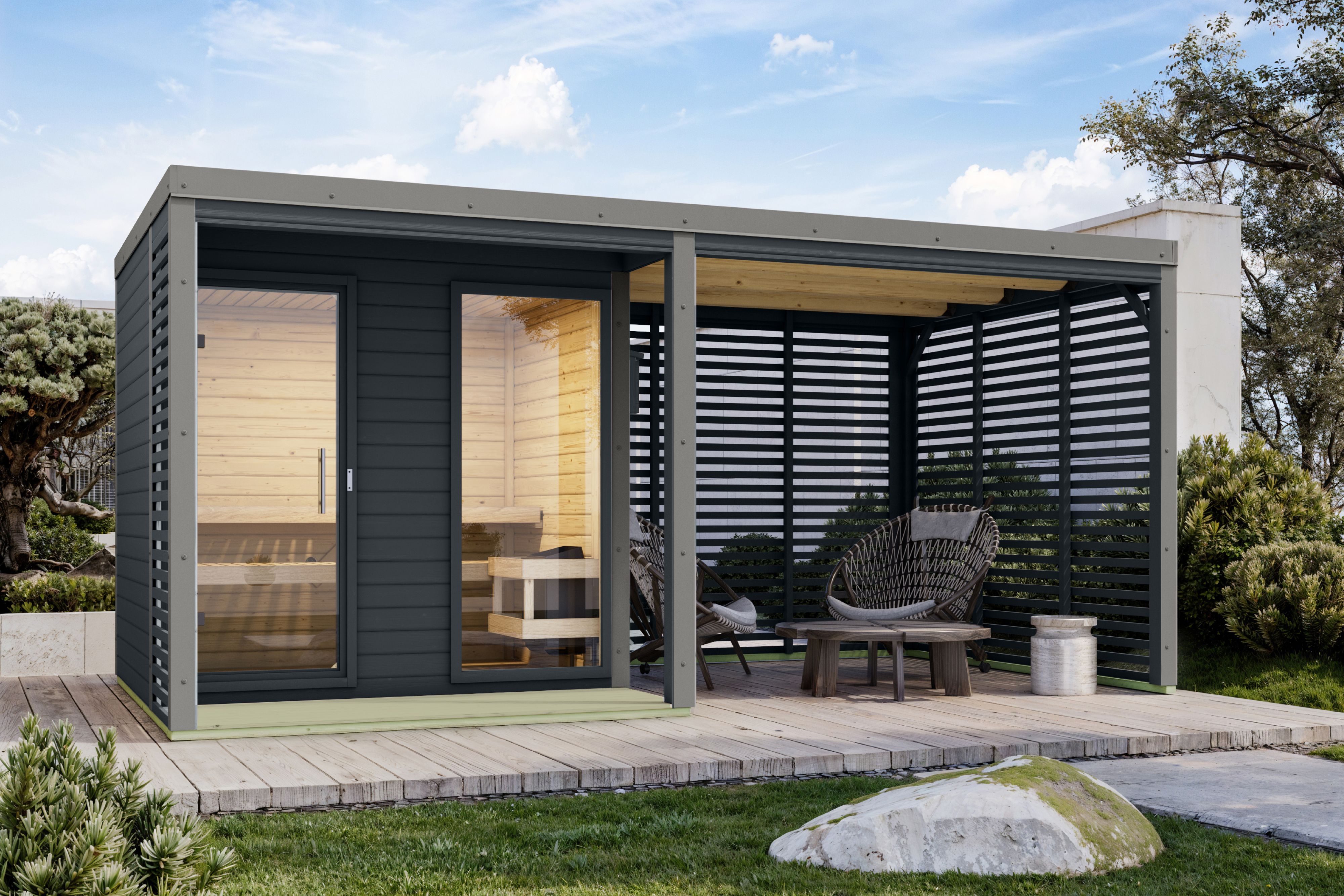 Karibu Saunahaus Ares 2 mit 2,70 m Anbaudach als Gartensauna aus Massivholz im Garten mit Glasfront